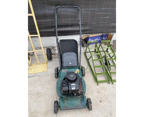 A PETROL ROTARY LAWNMOWER WITH BRIGGS AND STRATTON ENGINE AND GRASS BOX 