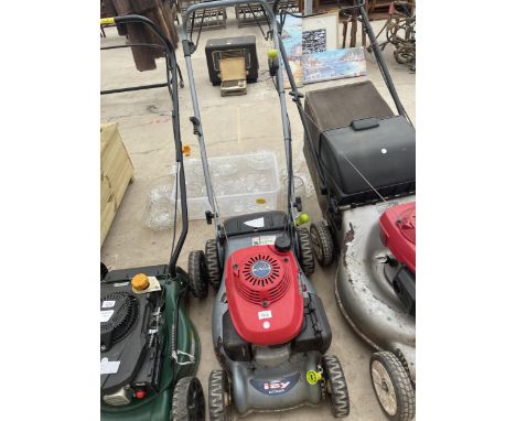 A HONDA PETROL LAWN MOWER WITH NO GRASS BOX, ENGINE BELIEVED IN WORKING ORDER BUT SLIGHT CORROSION TO THE DECK 
