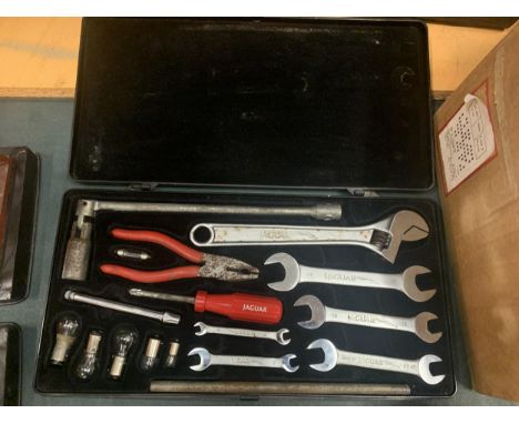 A VINTAGE TOOL KIT FOR A JAGUAR CAR 