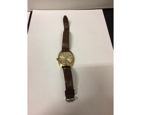 A SUPEROMA VINTAGE WRIST WATCH WITH BROWN LEATHER STRAP SEEN WORKING BUT NO WARRANTY 