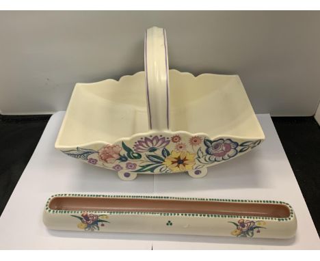 TWO PIECES OF POOLE POTTERY TO INCLUDE A BASKET AND A LONG DISH 