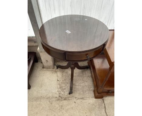 A REPRODUCTION DRUM TABLE WITH THREE FRIEZE DRAWERS ON TRIPOD BASE, 20" DIAMETER 