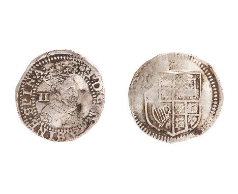 A silver hammered halfgroat of James I (1603-1625) dating c. 1603-1604. First coinage, Tower mint, initial mark: Thistle. Obv