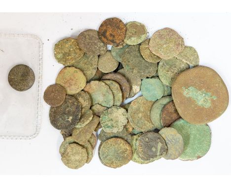 A mixed lot of forty-nine copper-alloy Roman coins. Most pieces Constantinian, though there is also a smattering of later 3rd