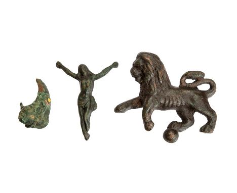A small mixed lot of metal detecting finds. Within this lot, a fragment of a copper-alloy and enamel headstud type brooch dat