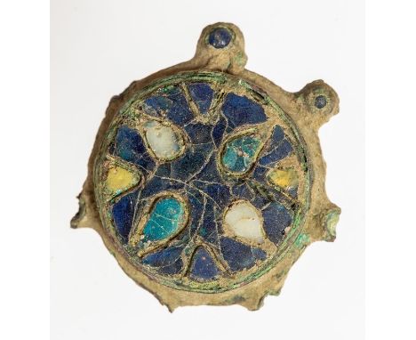 An incomplete cast copper-alloy gilt and enamel cloisonné disc brooch of the 'Saunderton' type, dating to the Late Early Medi