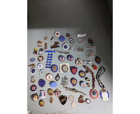 A collection of enamel sporting and other badges to include Boston Speedway, Newbury and Ripon race clubs, various football c