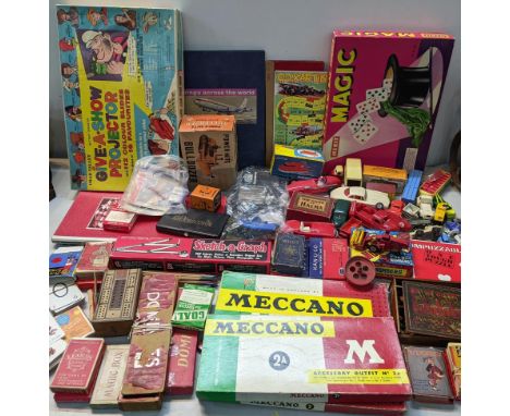 A mixed lot of toys and games to include boxed Meccano, Chad Valley Give A Show Projector, boxed cards, Marx Bulldozer and ot