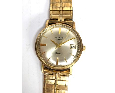 A Rotary manual winding gents 9ct gold wristwatch, having a silvered dial with centre seconds and baton hour markers, date ap
