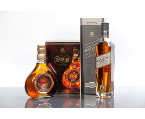 JOHNNIE WALKER 18 YEAR OLD PLATINUM LABEL 
Blended Scotch whisky. 700ml, 40% volume. In display box.
JOHNNIE WALKER SWING 
Bl