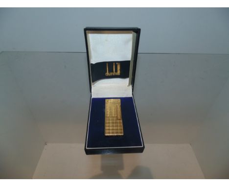 Gold plated Dunhill lighter in original box 
