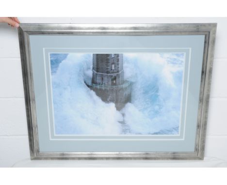 A lighthouse print. Condition Report: 20% VAT will be charged on the hammer price in addition to our normal commission charge