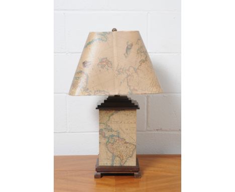 An atlas print decorated table lamp and shade, height including ball finial 70cm. Note: This is a 110/120 volt appliance. Con