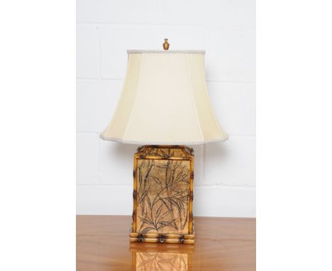 A chinoiserie table lamp with faux bamboo and bamboo gold ground painted panel, shaped shade, height including urn senile 75c