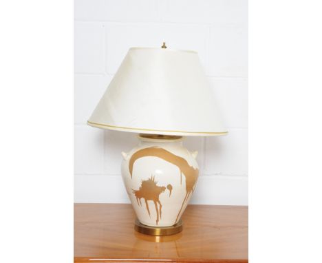 An oriental jar table lamp with crackle ivory glaze, splashed with gilding, matching shade, height including finial 70cm. Not