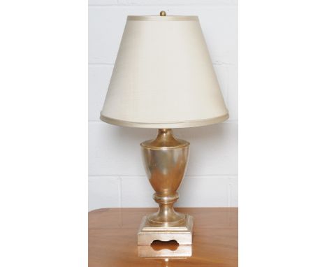 An antique silver lustre table lamp of vase shape with shade, max height 78cm.
Note: This is a 110/120 volt appliance. Condit