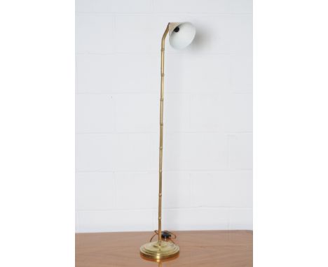 A faux bamboo brass standard lamp, with foot switch. Note: This is a 110/120 volt appliance. Condition Report: 20% VAT will b