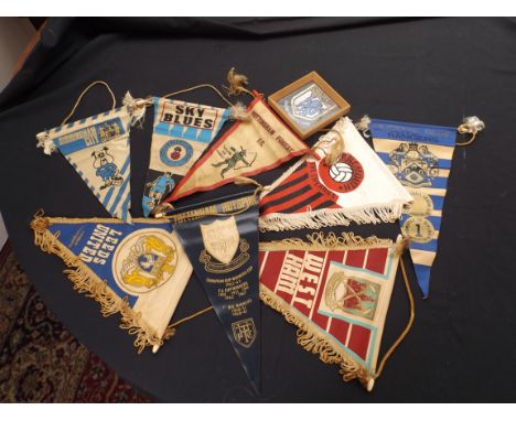 A group of 8 small pennants; plus a small framed item.