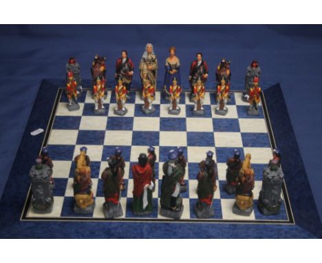 A BOXED STUDIO ANNE CARLTON CHESS SET BRITISH AND SCOTTISH SOLDIERS