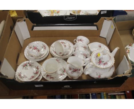 A TRAY OF ROYAL ALBERT LAVENDER ROSE TEA AND DINNERWARE (TRAY NOT INCLUDED) Teapot (damage to the spout Sugar and cream jug (