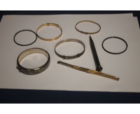 A HALLMARKED SILVER BANGLE TOGETHER WITH WHITE METAL AND ROLLED GOLD EXAMPLE