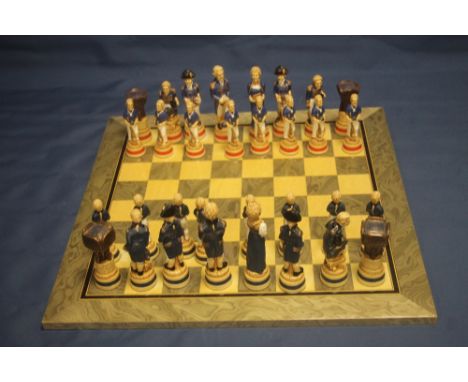 A BOXED STUDIO ANNE CARLTON CHESS SET |BATTLE OF TRAFALGAR|
