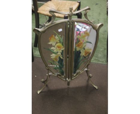 A DECORATIVE CAST FIRESCREEN