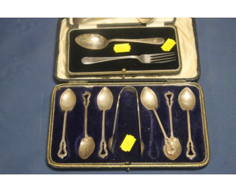 A CASED SET OF 6 SILVER SPOONS AND A BOXED SPOON AND FORK SET