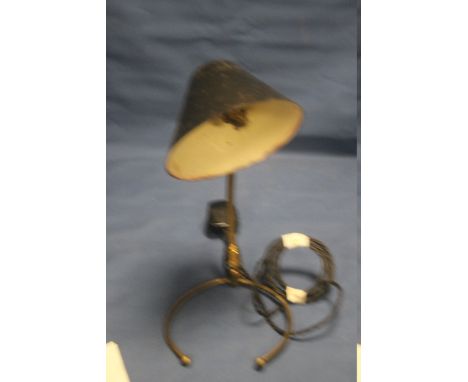 AN UNUSUAL VINTAGE COMBINATION TABLE LAMP/ WALL LIGHT WITH PAINTED METAL SHADE AND BRASS BASE