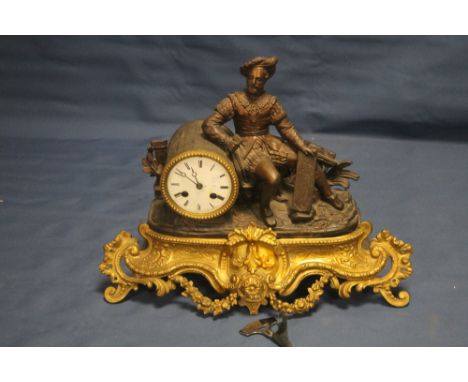 A VINTAGE METAL AND GILT MANTLE CLOCK