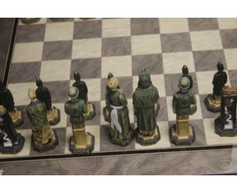 A UNBOXED STUDIO ANNE CARLTON CHESS SET |AMERICAN INDEPENDENCE|