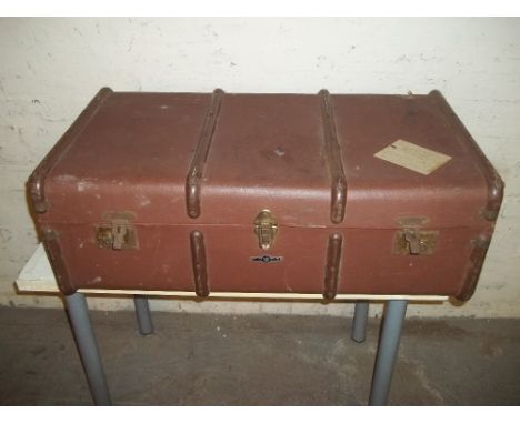A FOUR BANDED STEAMER TRAVEL TRUNK