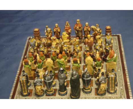 A UNBOXED STUDIO ANNE CARLTON CHESS SET TOGETHER WITH ANOTHER, TO INCLUDE CRUSADES AND VIKINGS