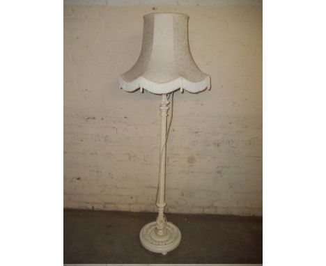 A FLOOR STANDING STANDARD LAMP