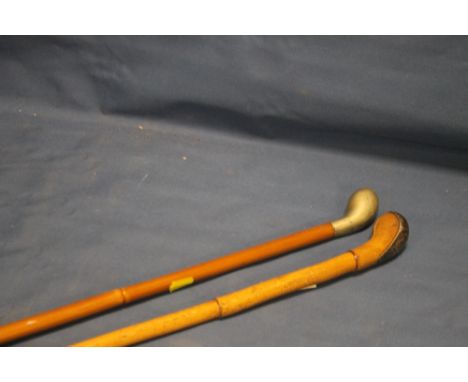 TWO ANTIQUE SUNDAY GOLF CLUB STYLE WALKING STICKS ONE WITH SILVER MOUNTS (2)