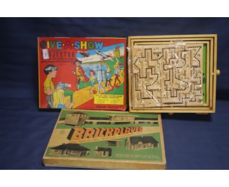 A BOXED BRICKPLAYER BUILDING KIT, together with a Chad Valley projector etc