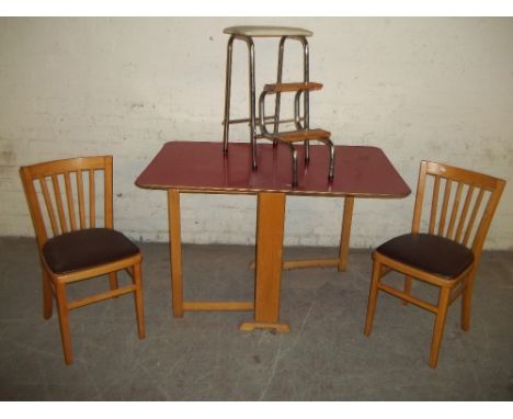 A RETRO FORMICA GATE LEG DROP LEAF KITCHEN TABLE, WITH 2 CHAIRS AND A CHROME STEP STOOL