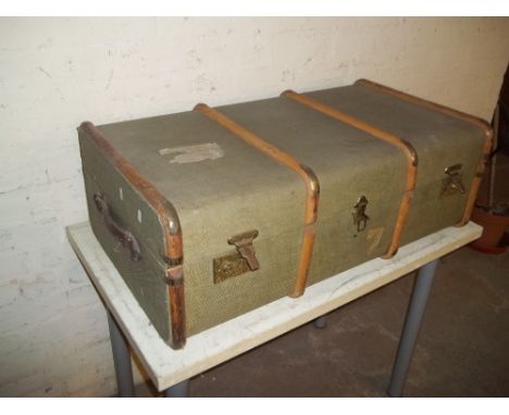 A FOUR BANDED STEAMER TRAVEL TRUNK