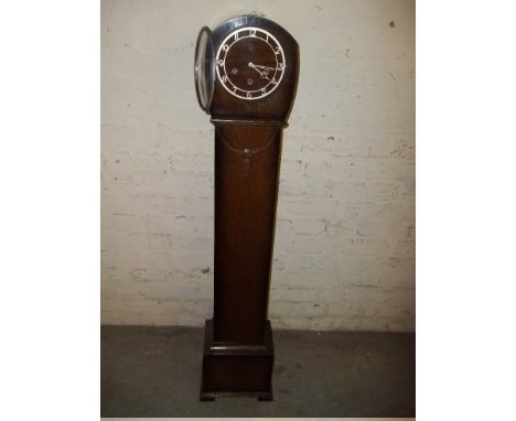 A VINTAGE GRAND DAUGHTER CLOCK
