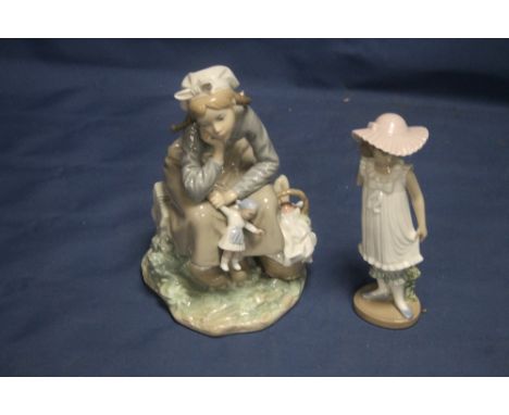 A LLADRO TOGETHER WITH A NAO FIGURINE 