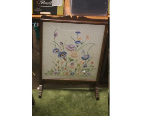 A FRAMED TAPESTRY FIRESCREEN