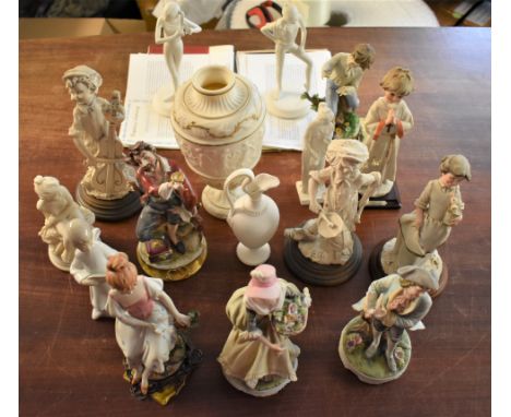 Porcelain and Ceramic figurines and Urn (17) a good mixed lot of Foreign porcelain figurines. A good collection of mostly Cla