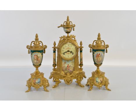 A contemporary Franz Hermle clock garniture, having porcelain panels the clock depicting seated woman being picked fruit by g