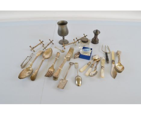 A quantity of silver plate, including Victorian and early 20th century flatware, knife rests, a EPNS pepper mill, a glass bod