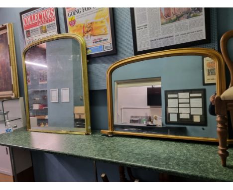 A large gilt over mantle mirror, 120cm high X 110 cm high, together with another with white ceramic bun feet, 81 cm X 124 cm 