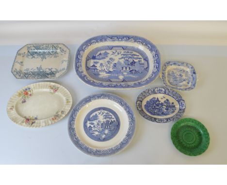 A quantity of assorted ceramics, including a large blue and white Old Willow pattern charger, 46cm x 44cm. Together with a Ro