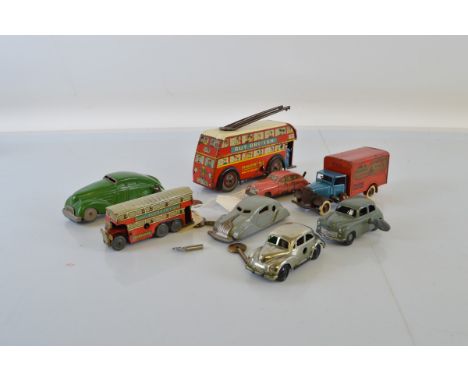 A collection of tinplate vehicle models, including Tri-ang Minic, Chad Valley, Schuco, Brimtoy, etc. (8) Together with a quan