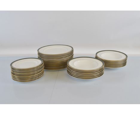 A part Royal Worcester Howard dinner service, comprising fourteen dinner plates, fourteen side plates and fourteen soup bowls