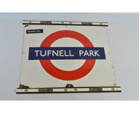 A vintage enamel London Underground sign for the Northern Line station  'Tufnell Park', approximately 55.5 x 71cm, having som