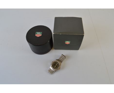 A Tag Heuer stell wristwatch, WE1110-R, with box and papers.